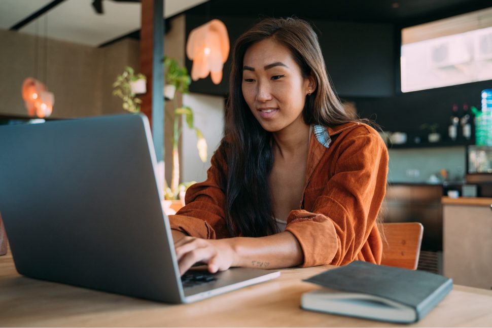 woman working on a laptop.